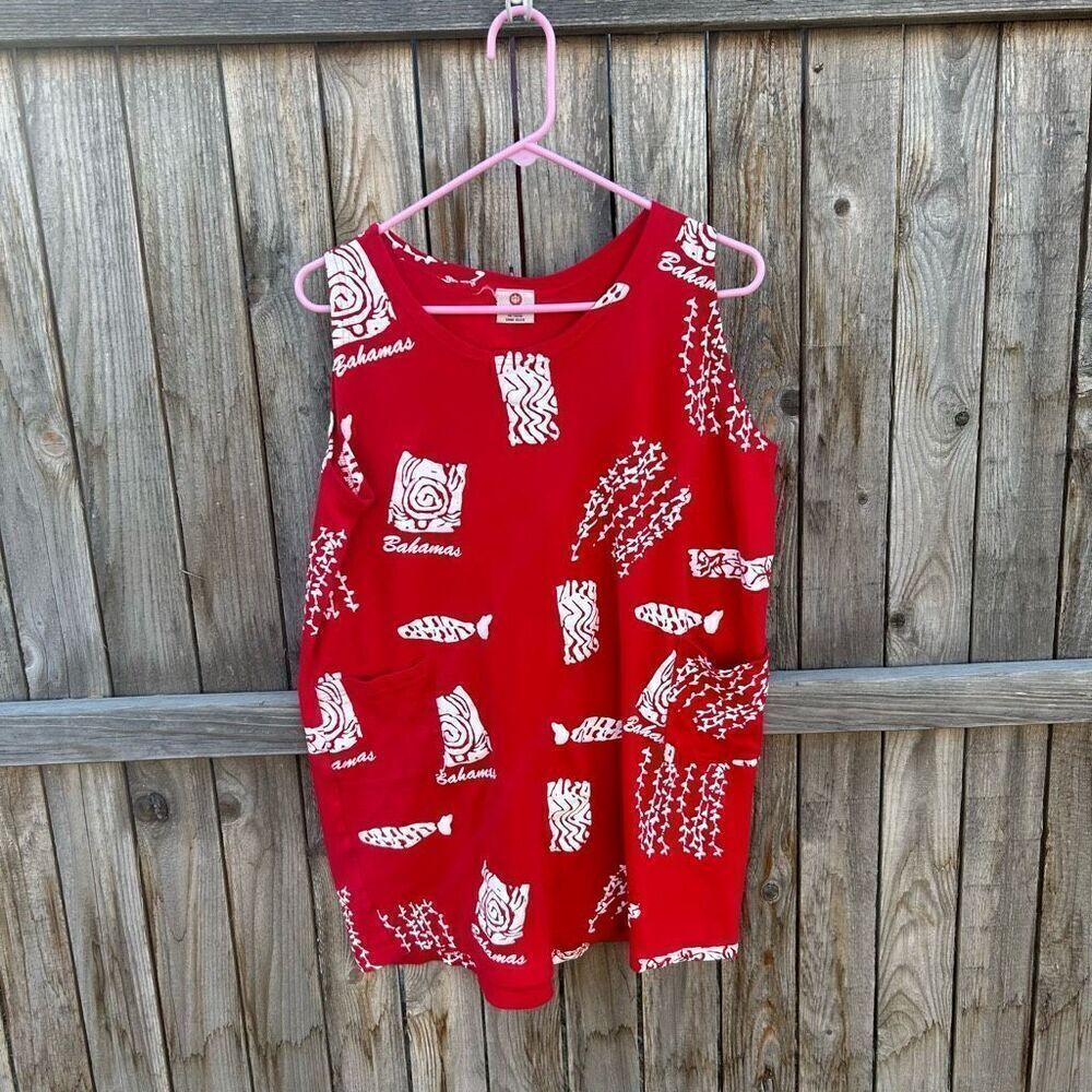 JoAnn’s sleeveless dress Bahamas pockets one size.